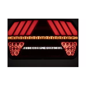ЗАДНИЙ ФОНАРЬ LED 12 / 24V С ТРЕУГОЛЬНИКОМ ПРАВ.
